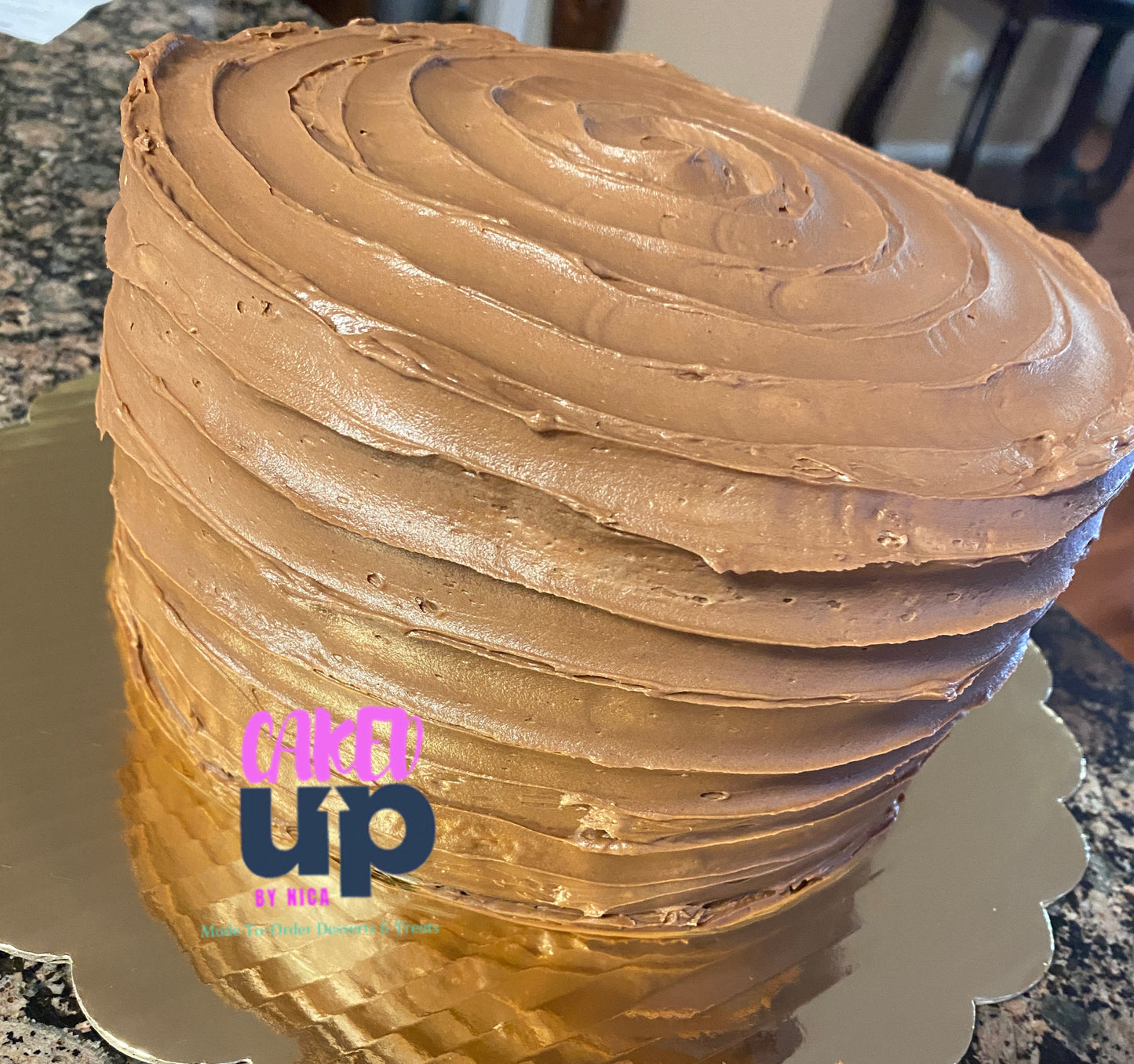 Yellow cake with Chocolate Buttercream layered Cake