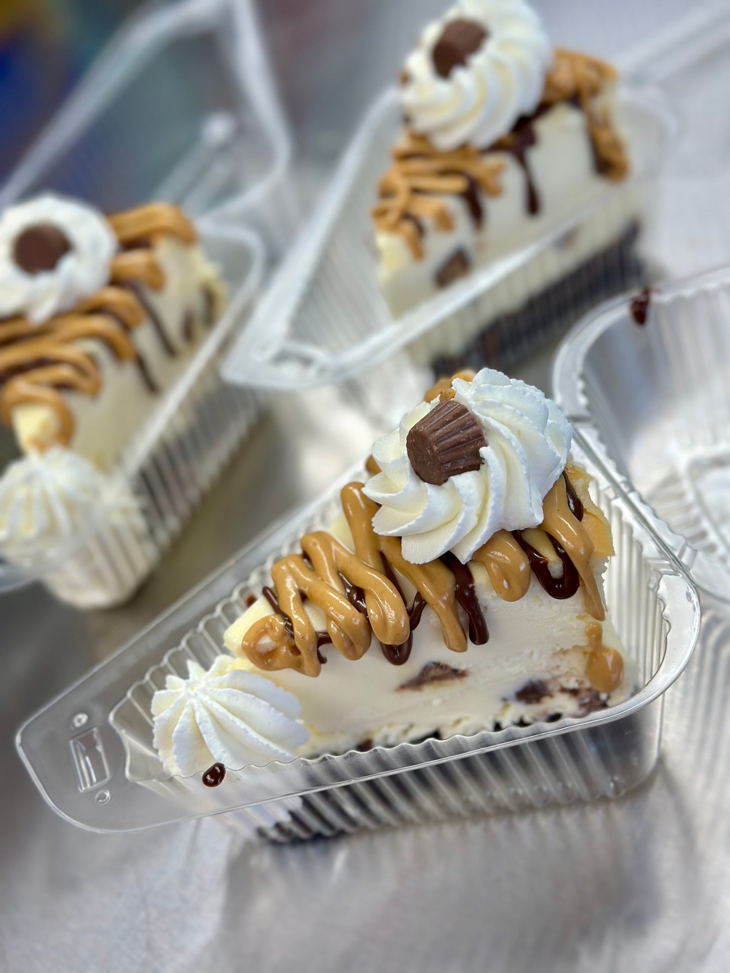 Peanut butter cup brownie cheesecake slice
